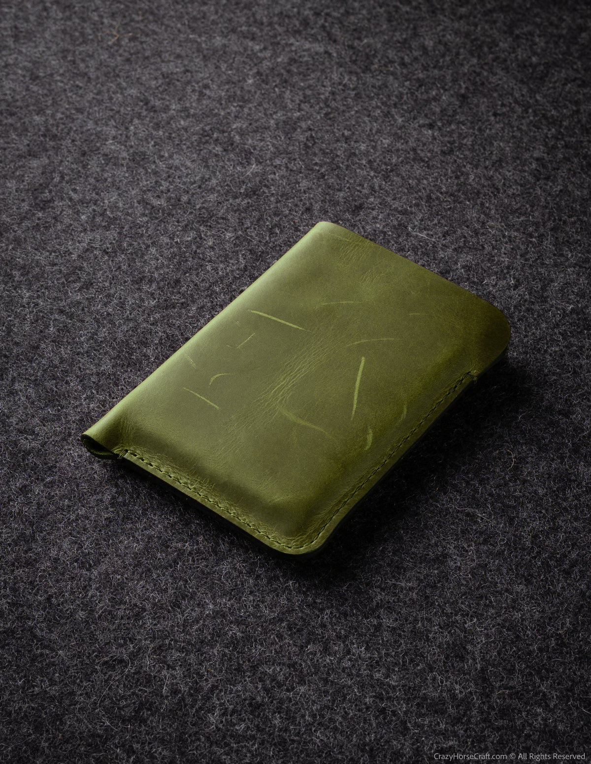 #color of the leather_alpine green